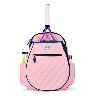 Front view of blush pink quilted kids tennis backpack with navy trim and zippers.