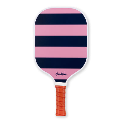 Navy and pink striped pickleball paddle with tan faux leather handle.