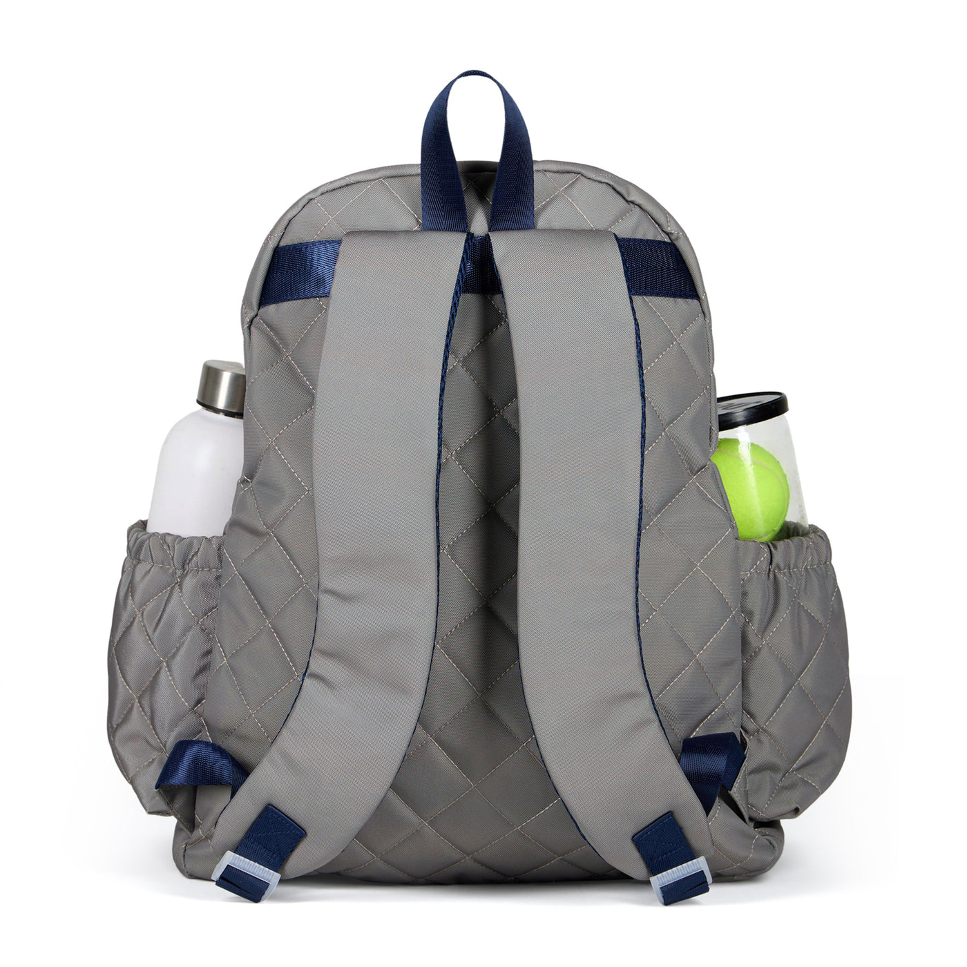 Women's tennis backpack with quilted grey nylon fabric and navy trim. The front pocket is holding a tennis racquet.