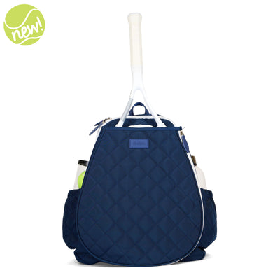 Women's tennis backpack with navy quilted nylon fabric and white trim. There is a tennis racquet in the front pocket.