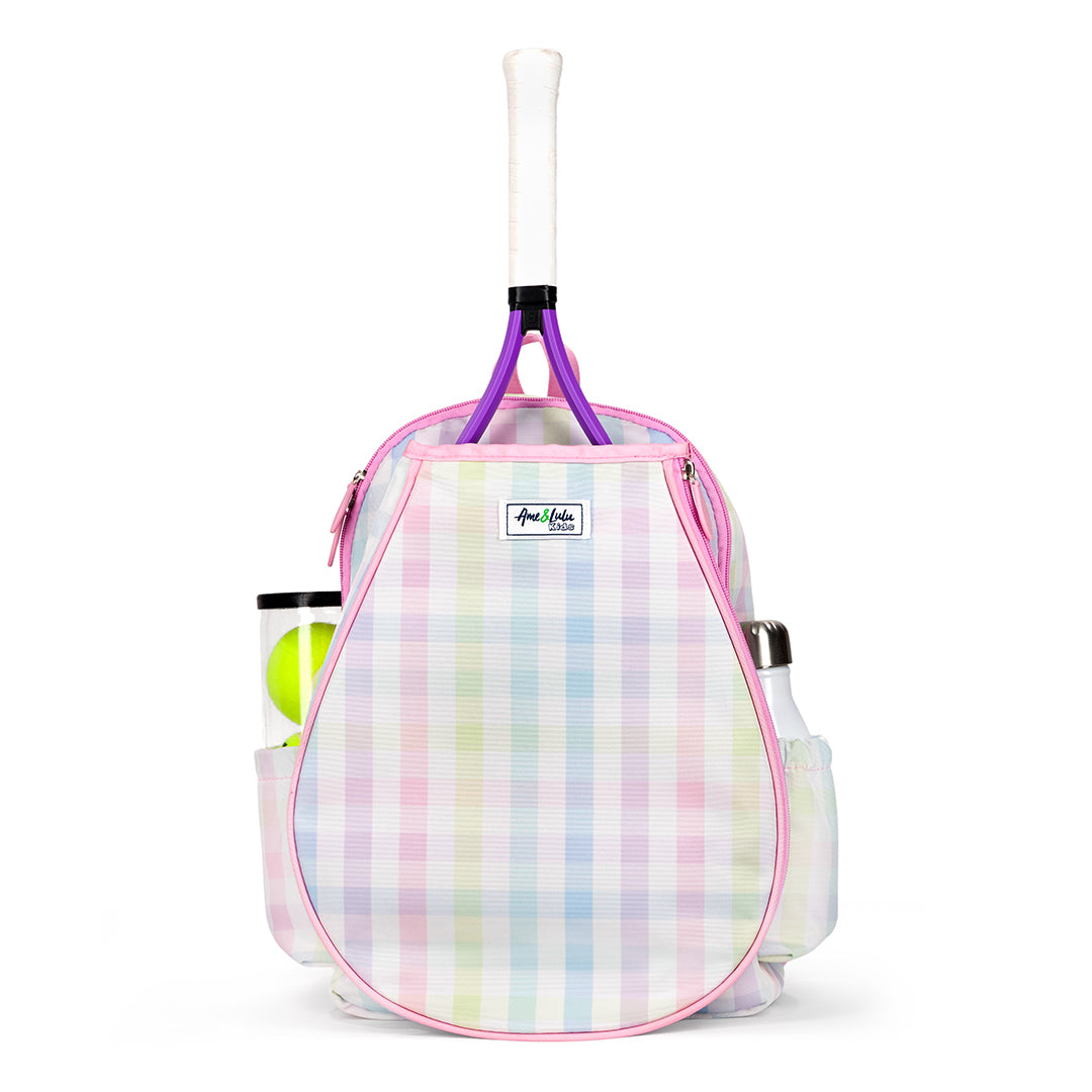 Front view of rainbow gingham patterned kids tennis backpack with pink trim and zippers. Front pocket holds tennis racquets