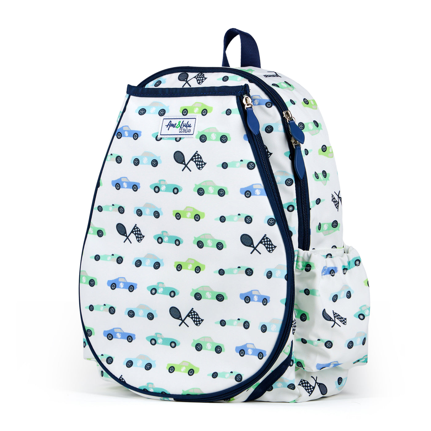 White kids tennis backpack with navy trim and blue and green racecars printed on the fabric. There is a tennis racquet in the front pocket.