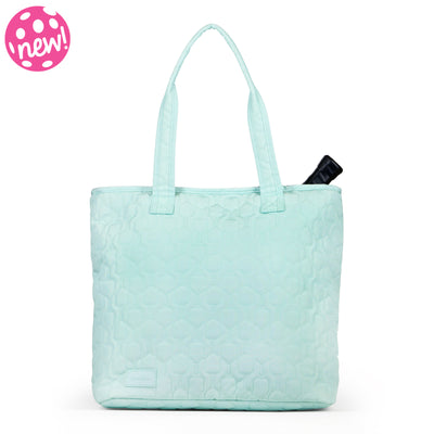 Light blue nylon pickleball tote with pickleball paddle quilted pattern.