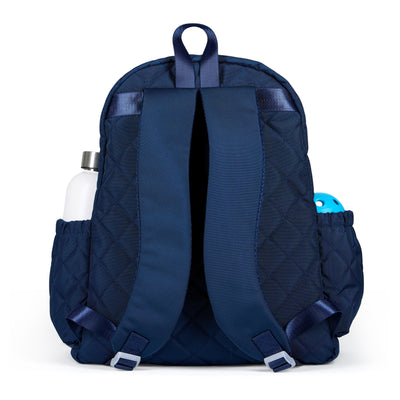 Quilted navy nylon pickleball backpack with paddle shaped pocket on the front with paddle inside.