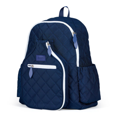 Quilted navy nylon pickleball backpack with paddle shaped pocket on the front with paddle inside.