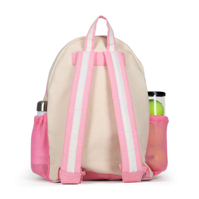 Natural canvas kids tennis backpack with pastel pink trim and water bottle pockets. There is a front tennis racquet pocket. A rainbow with a tennis ball is embroidered on the front pocket. 